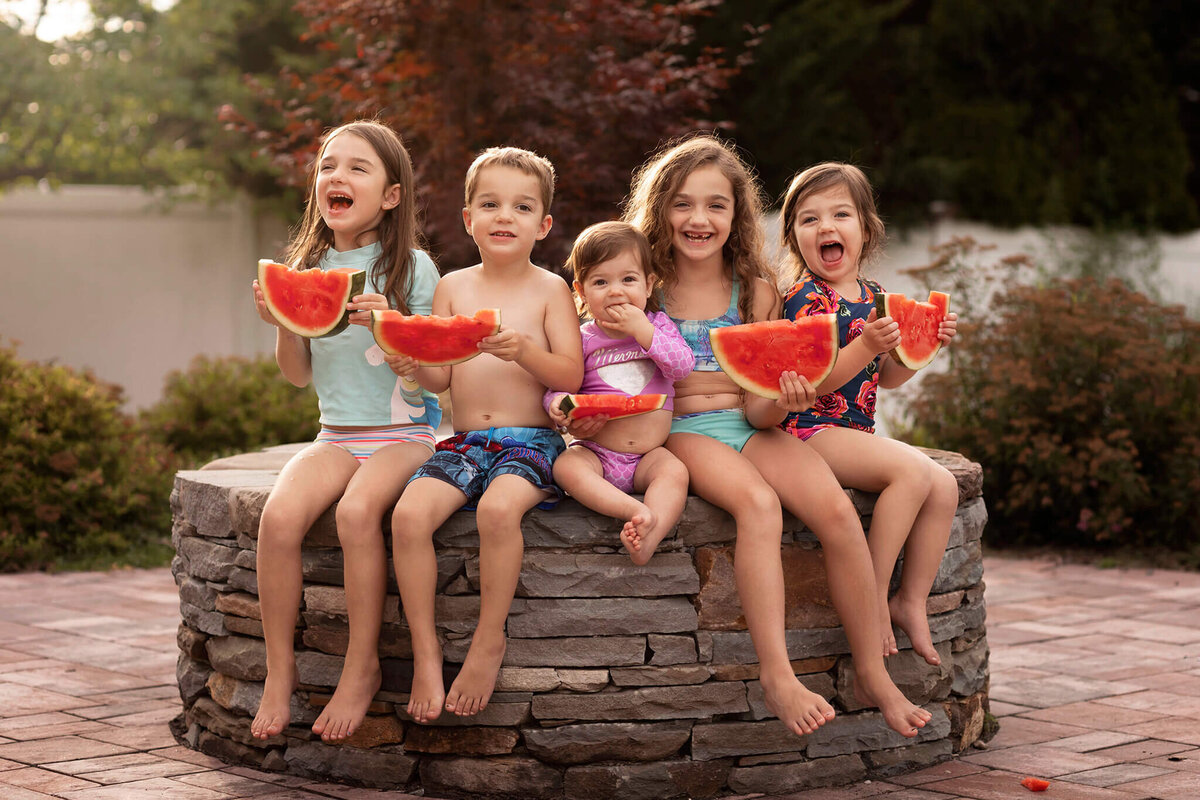 NJ Family photos of kids eating watermelon