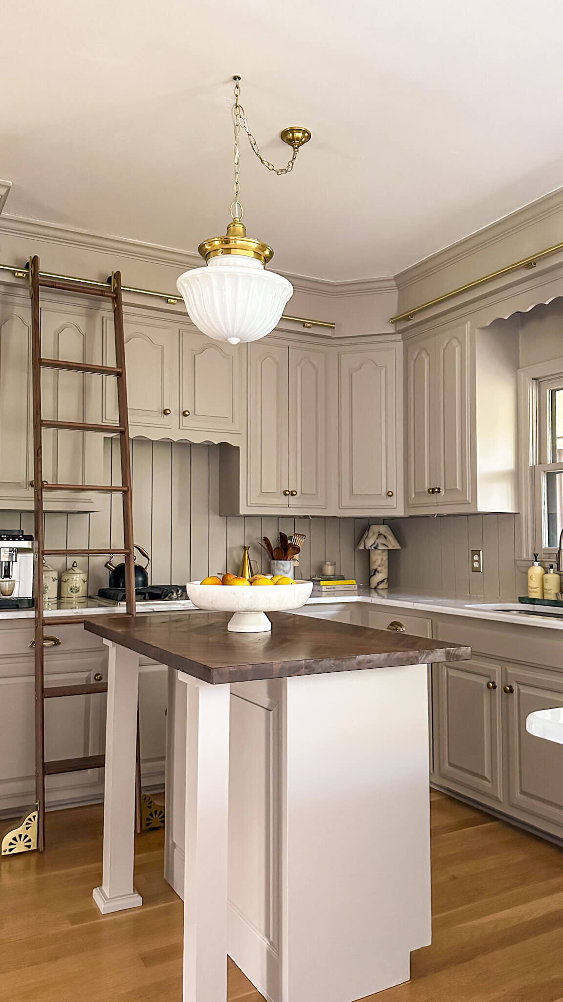 warm-kitchen-beige-timeless-library-ladder-walnut-marble