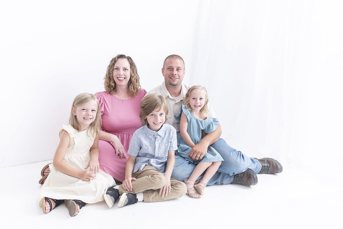 modern studio session with family posed