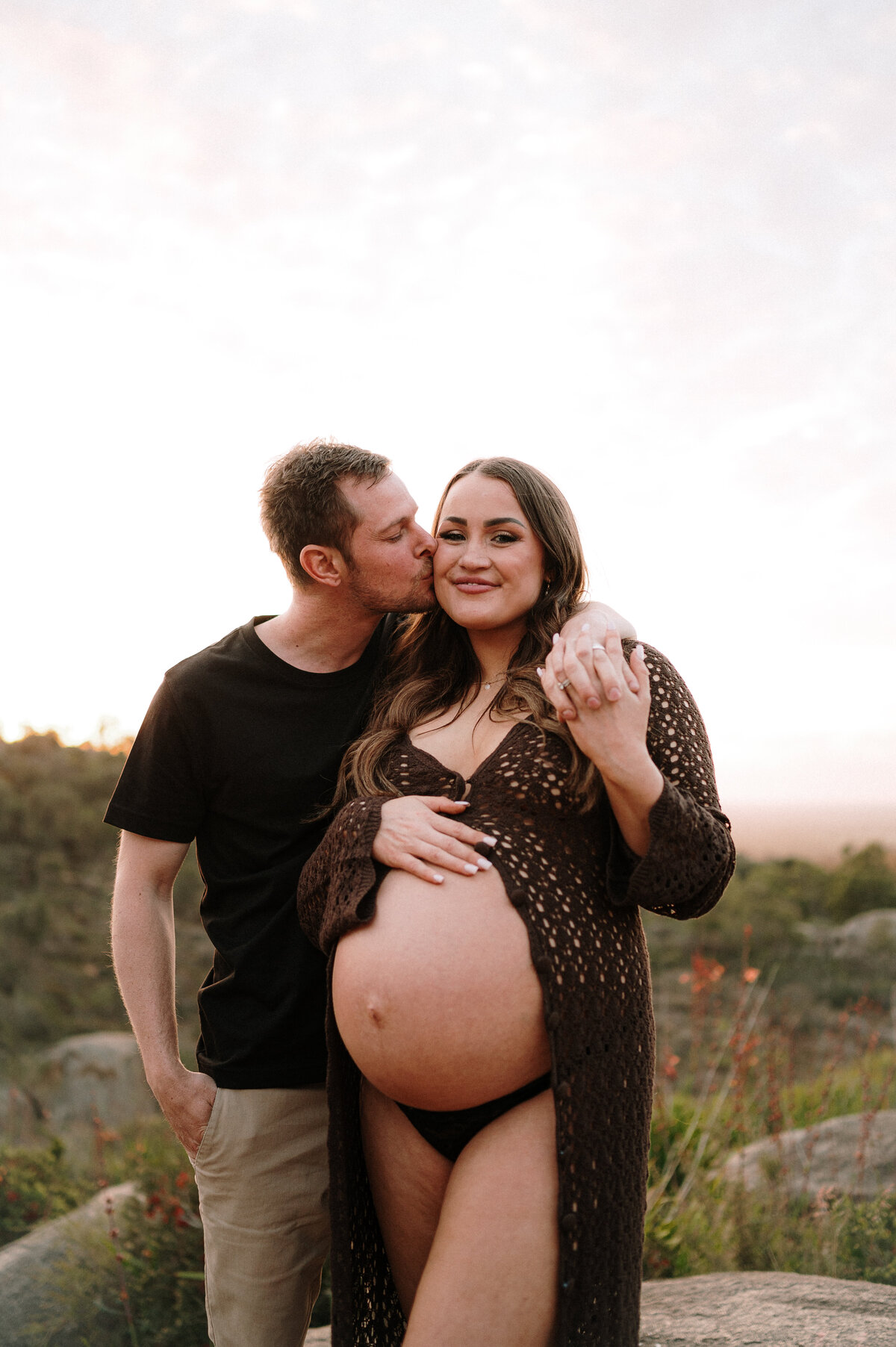 Candid pregnancy photo with relaxed posing