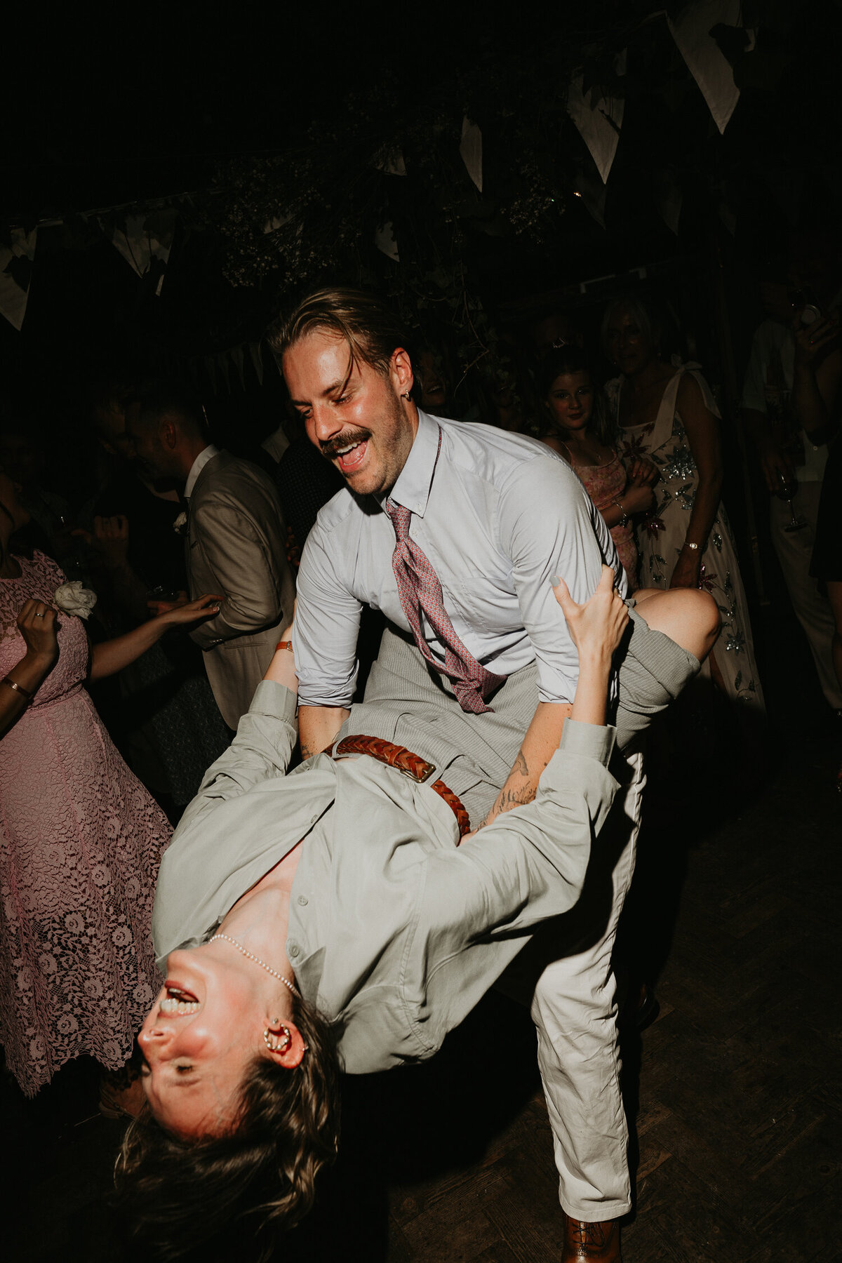 Professional dancers go crazy on the dance floor at a wedding in London. 