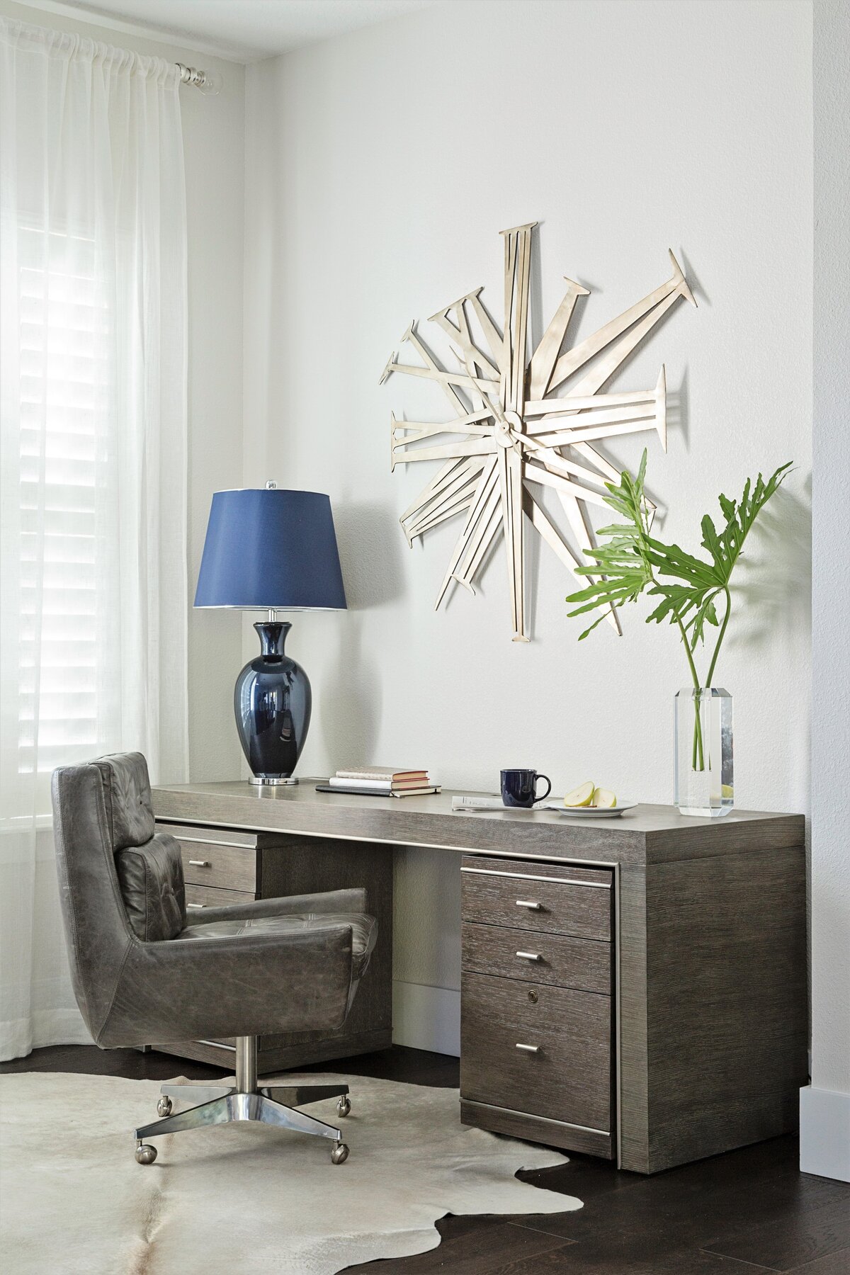 Black Fox Office Table with Blue Vase Lamp on Top and Comfy Revolving Chair