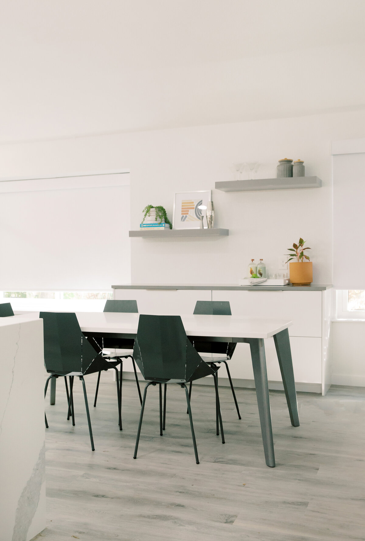 hello-home-sleek-modern-grey-and-white-kitchen-open-layout-modern-dining-table-austin-35