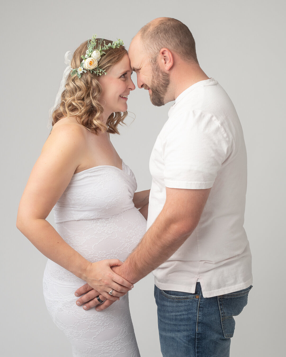 pregnant mom and partner gazing into each other's eyes