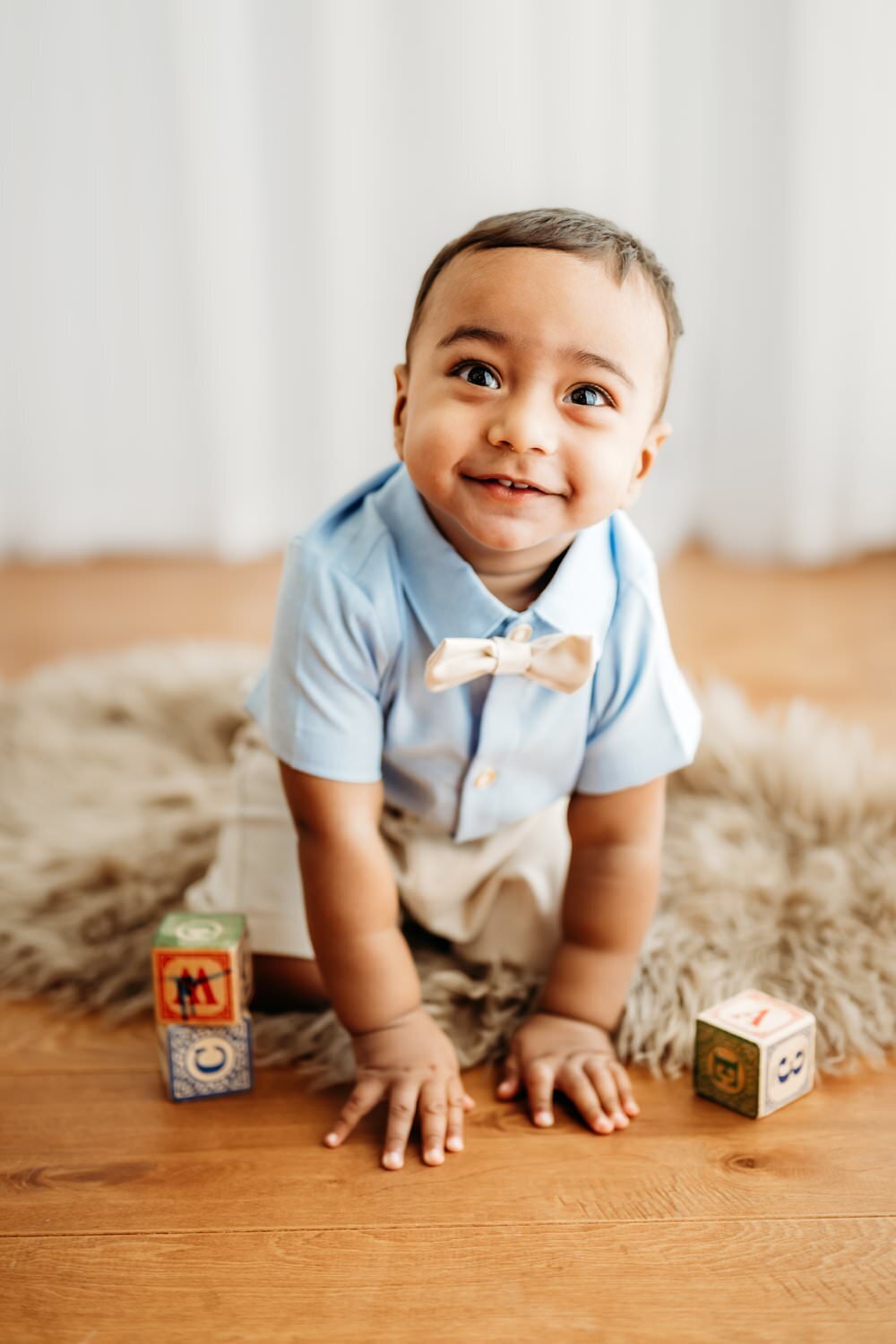 toddler playing with wooden blocks