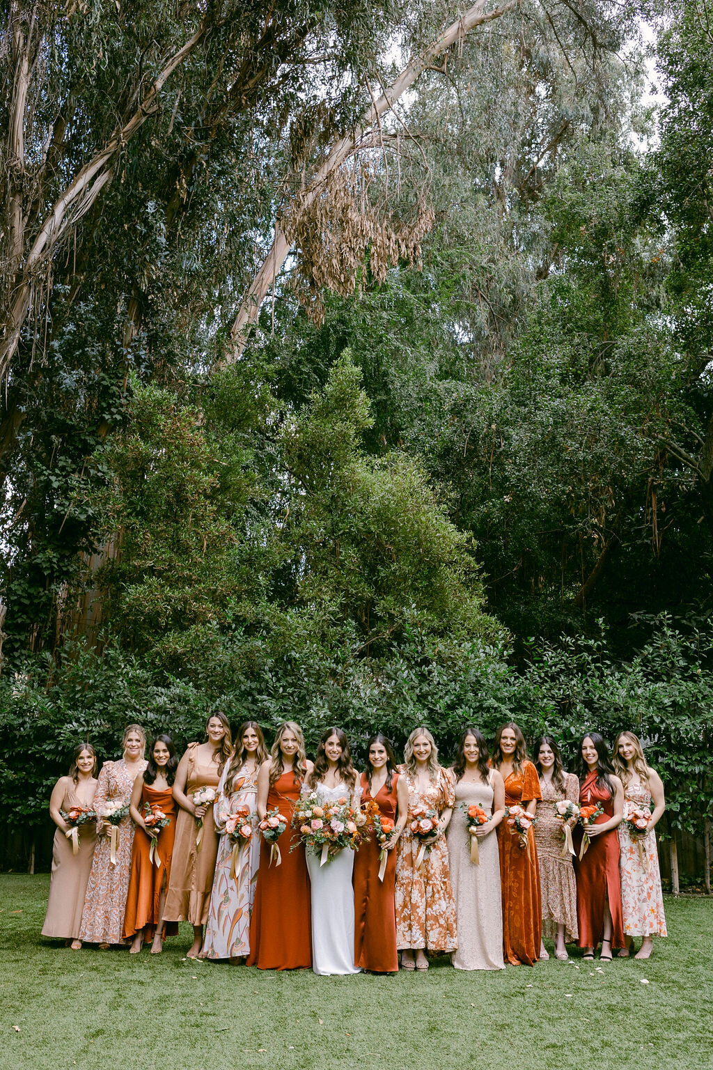 a mix of fall colors and prints for bridesmaid dresses