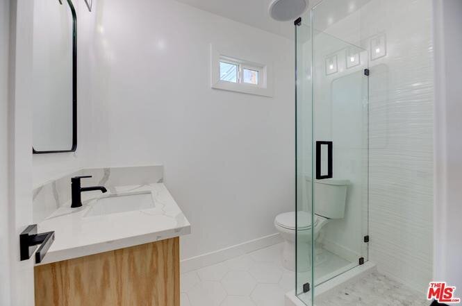aw-development-adu-bathroom-glass-shower-marble-vanity