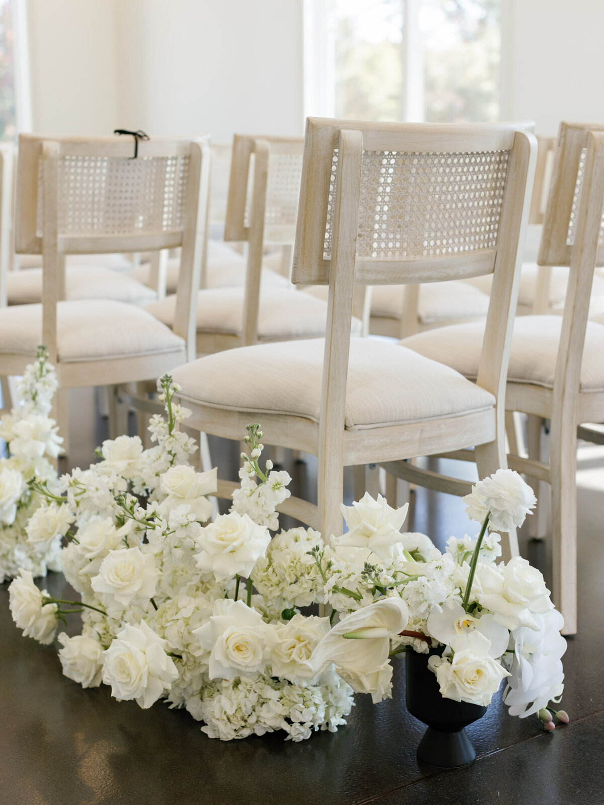 Gorgeous white floral design for a classic modern wedding ceremony. 