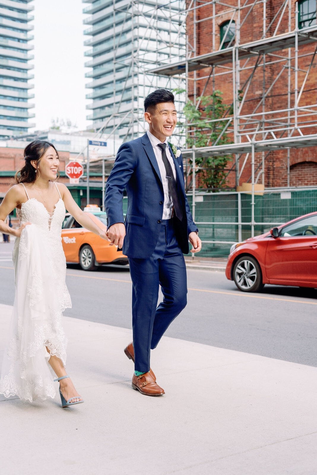 Happy Walking Couple at Distillery District Wedding Portraits Toronto Wedding Venue Jacqueline James Photography