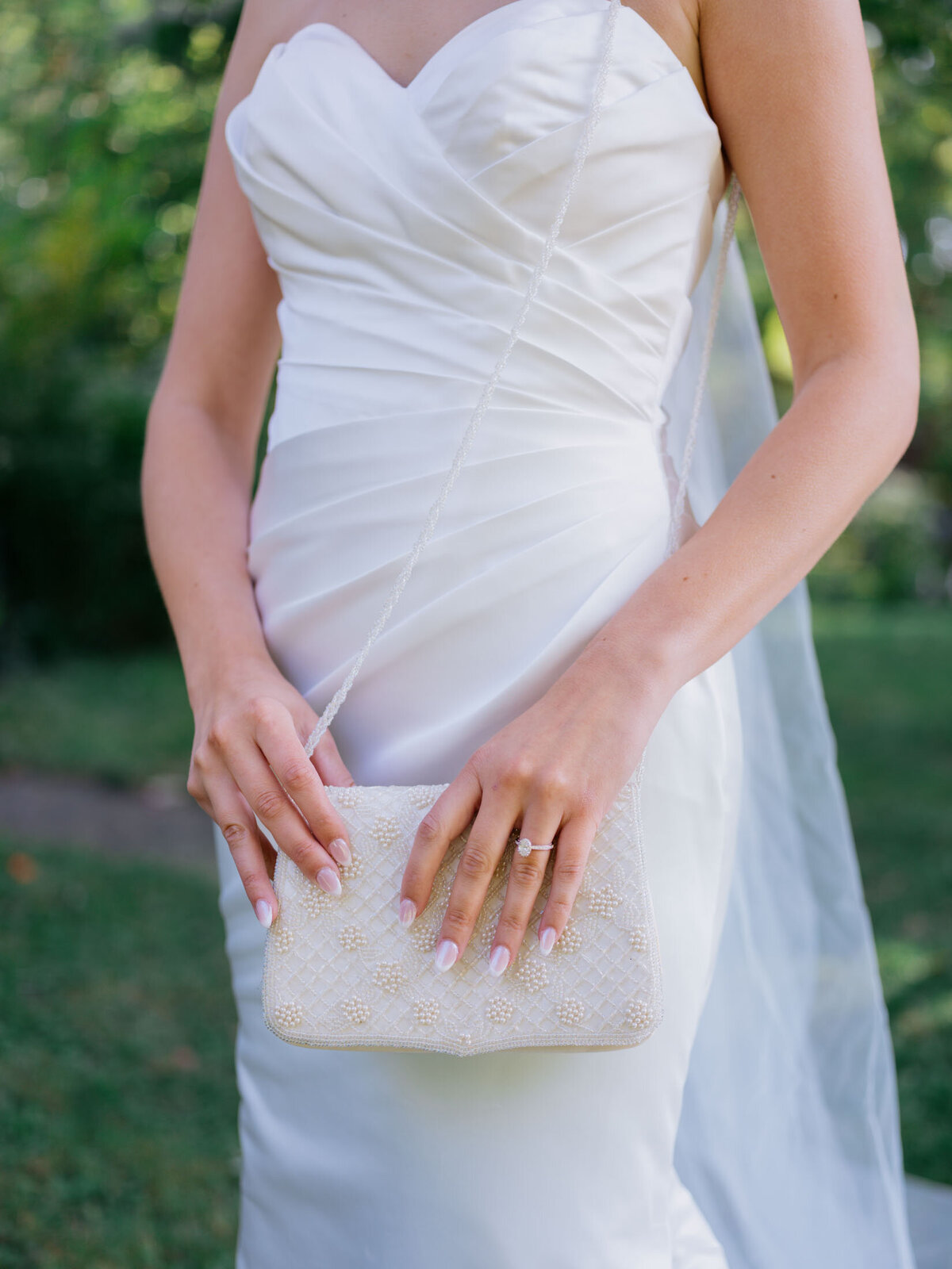 Bride in elegant Maggie Sottero gown at her backyard wedding