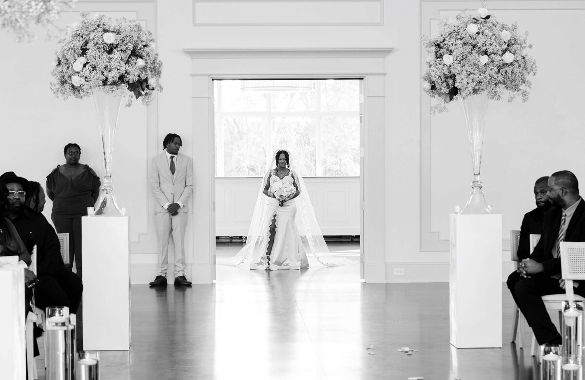 A stunning black-and-white shot captures the newlyweds stepping into their new life together.