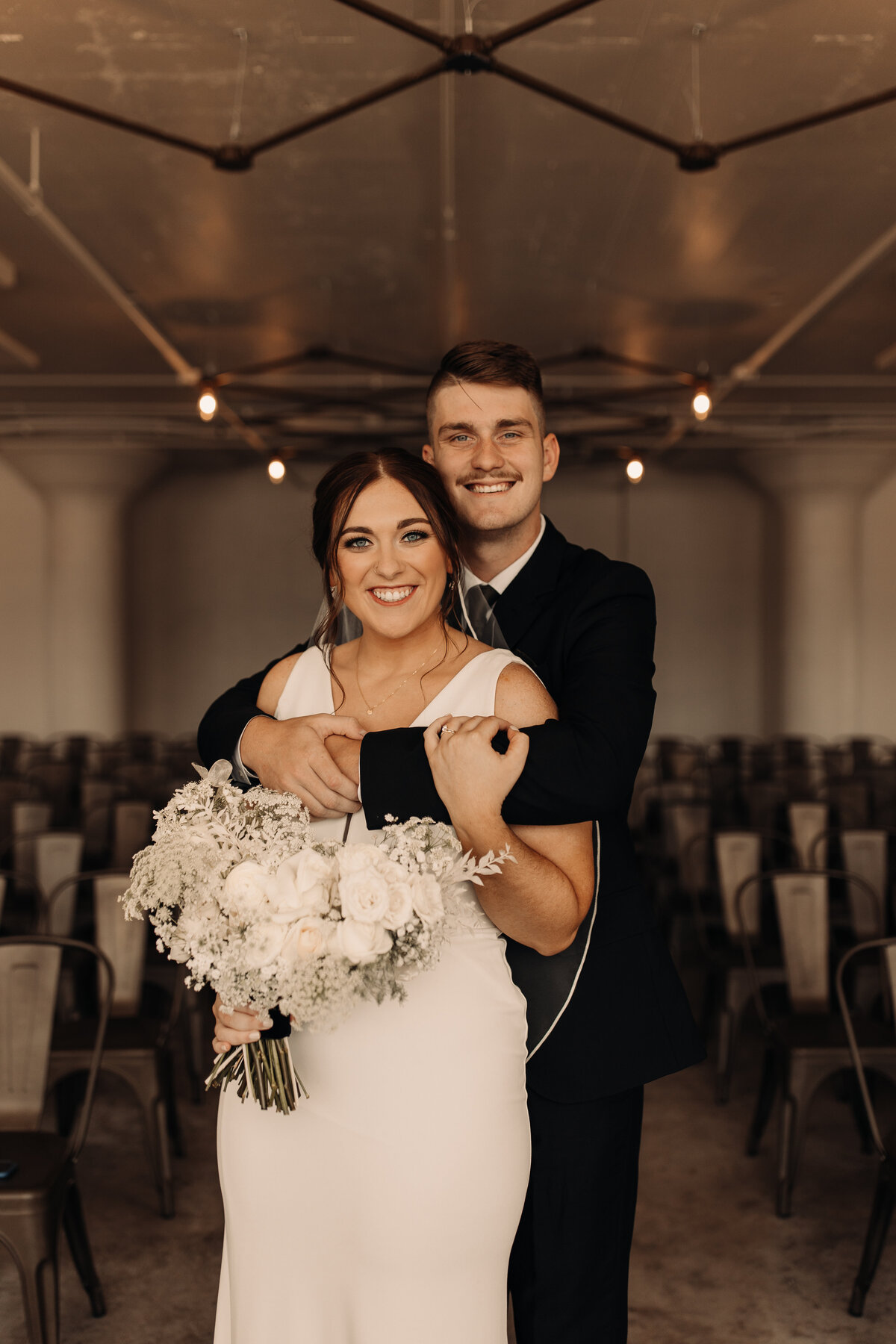 indoor wedding photography of bride and groom