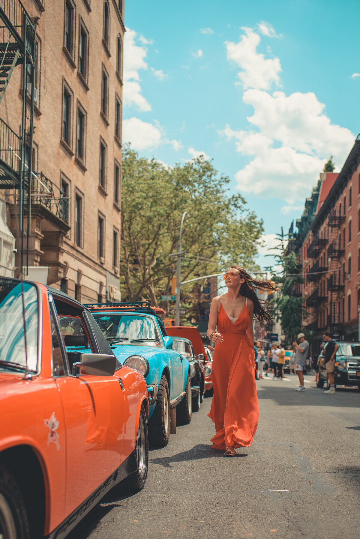 Woman-walking-retro-cars-downtown-iowa-city-photography