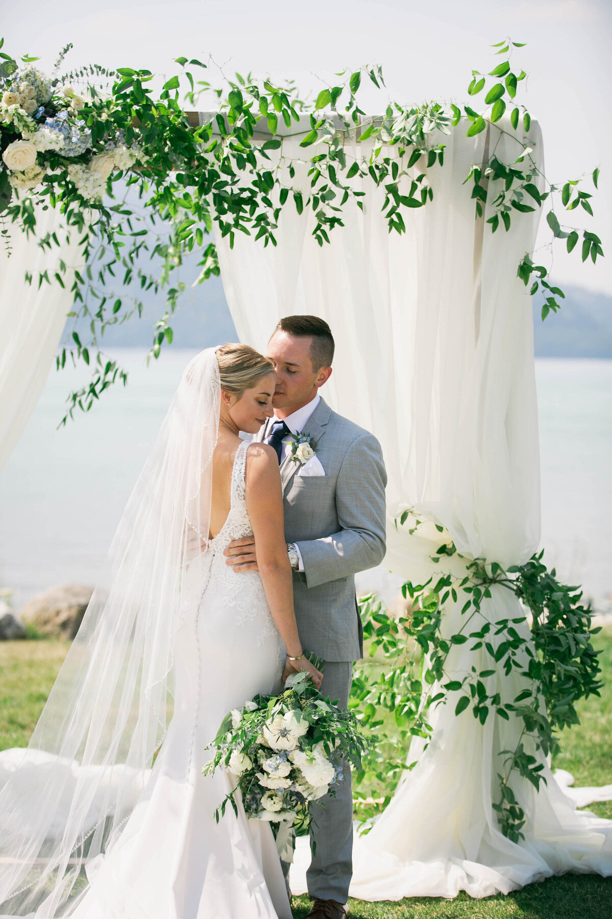 bride and groom embracing