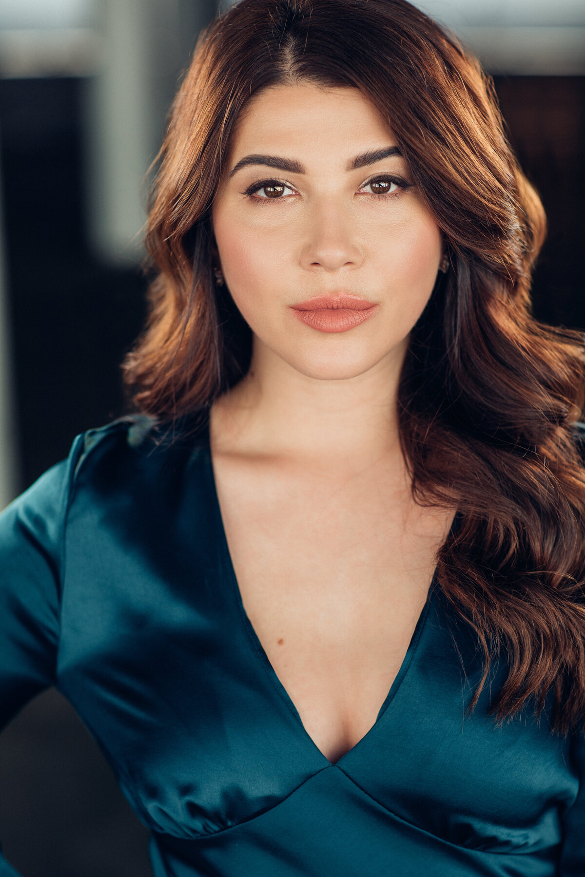 Headshot Photograph Of Young Woman In Dark Blue Blouse Los Angeles