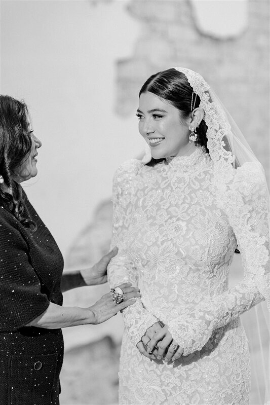 All lace wedding gown by Watters, worn by Sydney Watters
