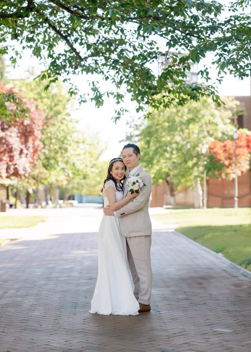 university of washington bride and groom quad under trees