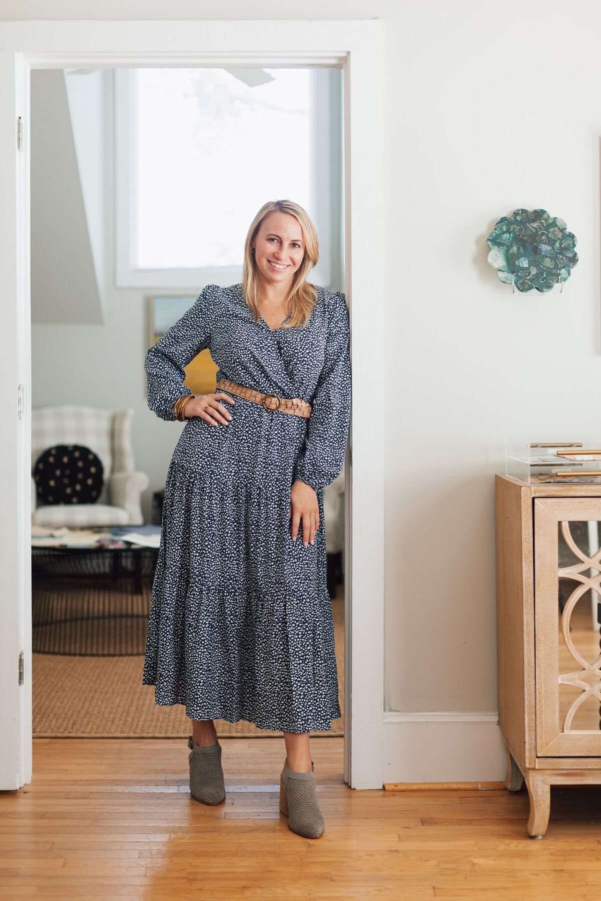 interior-design-firm-owner-standing-lifestyle-portrait-in-office-for-brand-session-dilworth-chalrotte