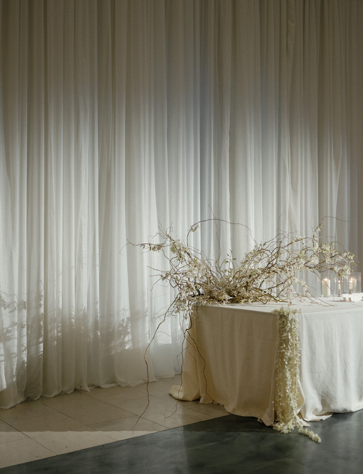 soft orchid floral install escort table design in Detroit