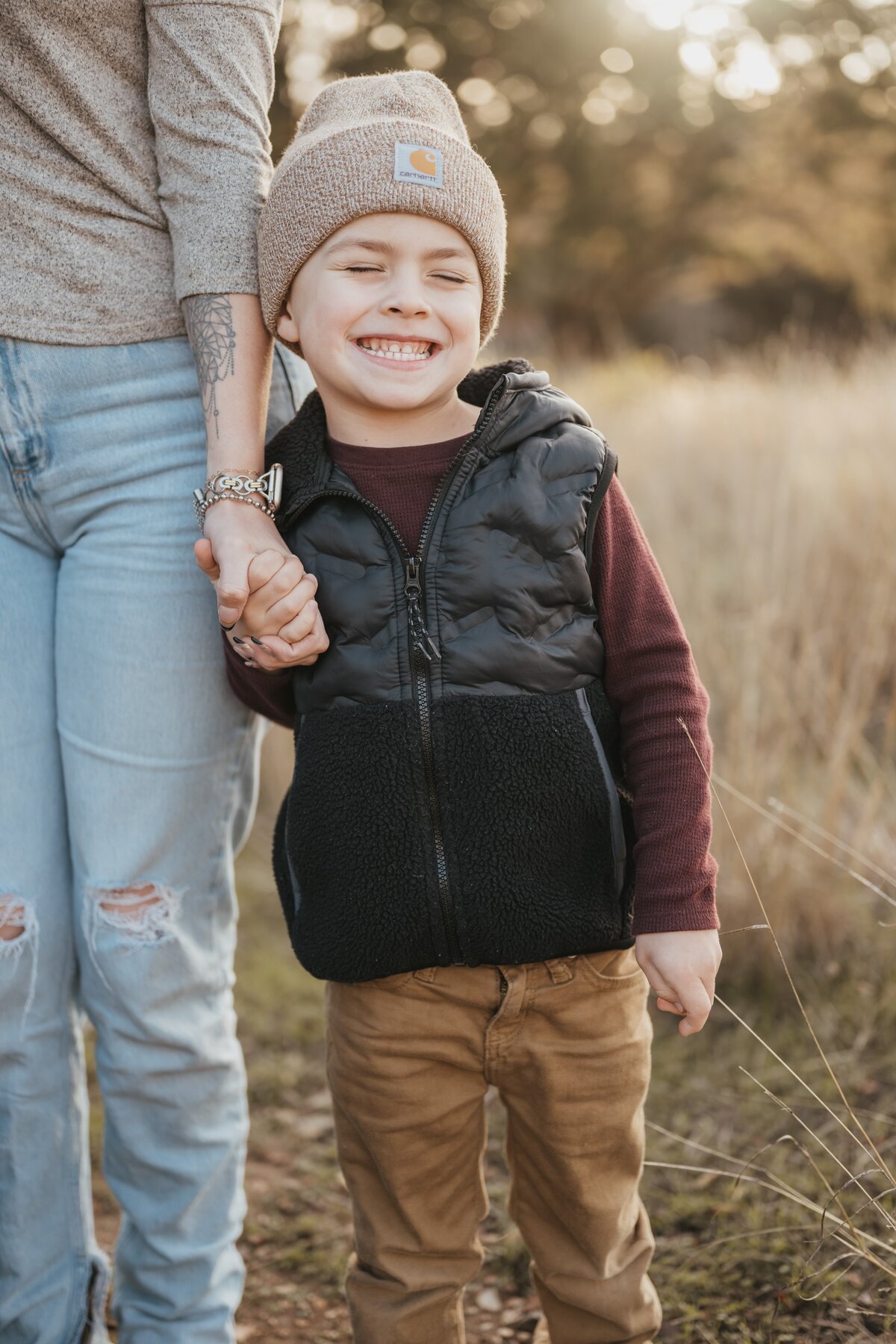 boy-holding-mom-hand