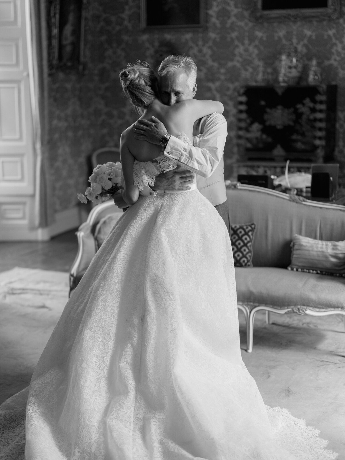 Bride hugging father