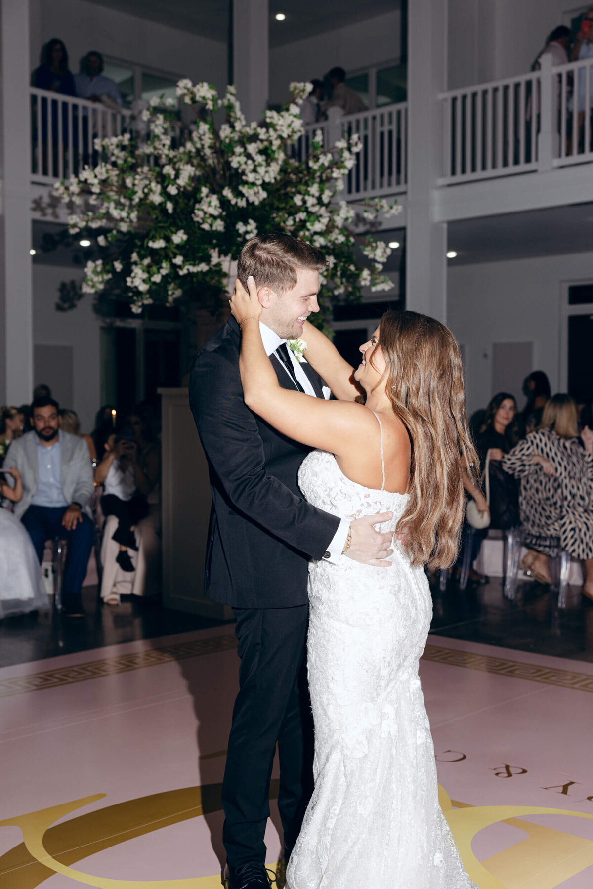 A photo of the bride and groom dancing during the wedding reception