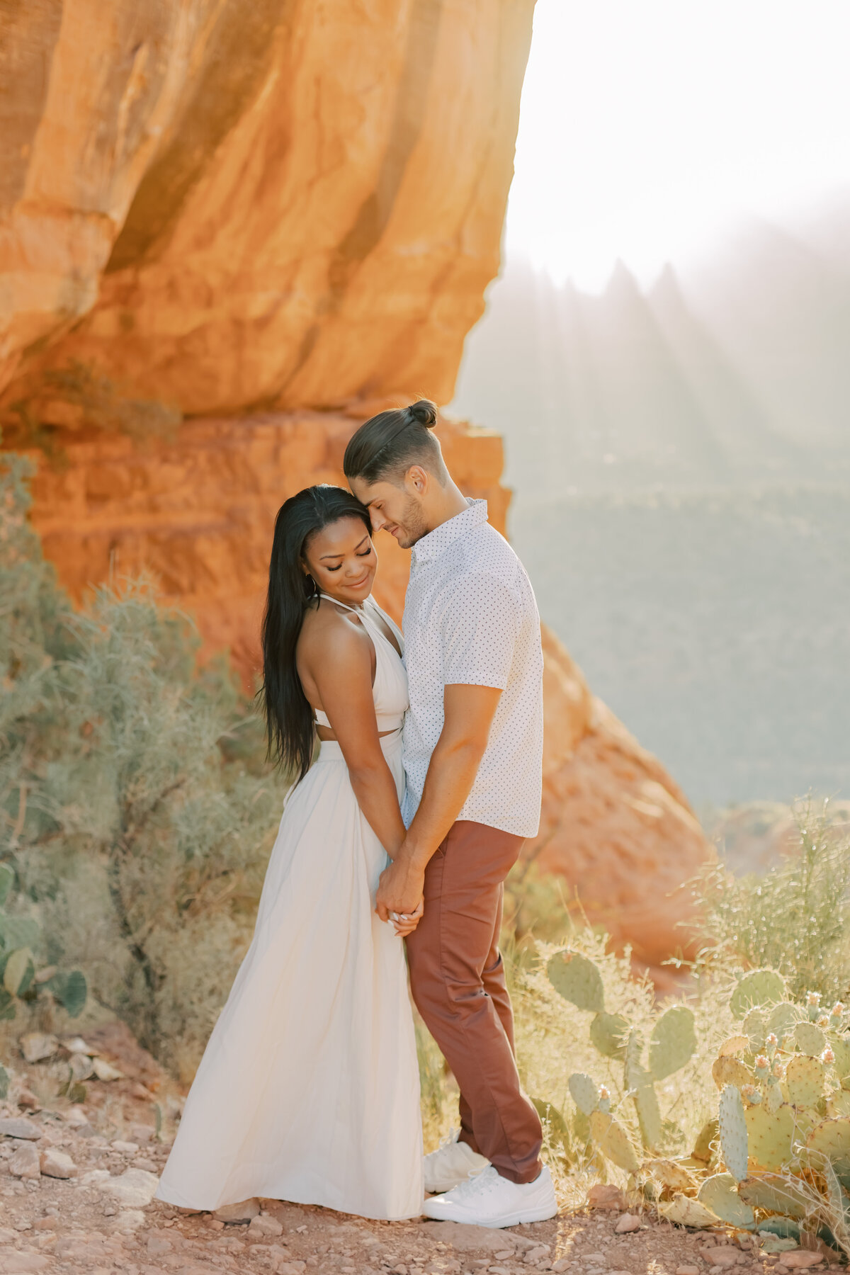 Capture the magic of a desert elopement with this stunning Scottsdale wedding. Golden hour light, cacti silhouettes, and intimate moments between the bride and groom make this a perfect desert wedding gallery.