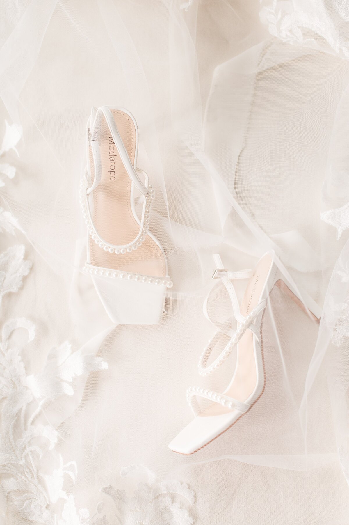 pearl wedding shoes with veil on top