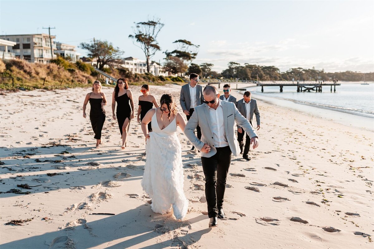 Hannah & Cory having a phot shoot together with their bridesmaids and groomsmen