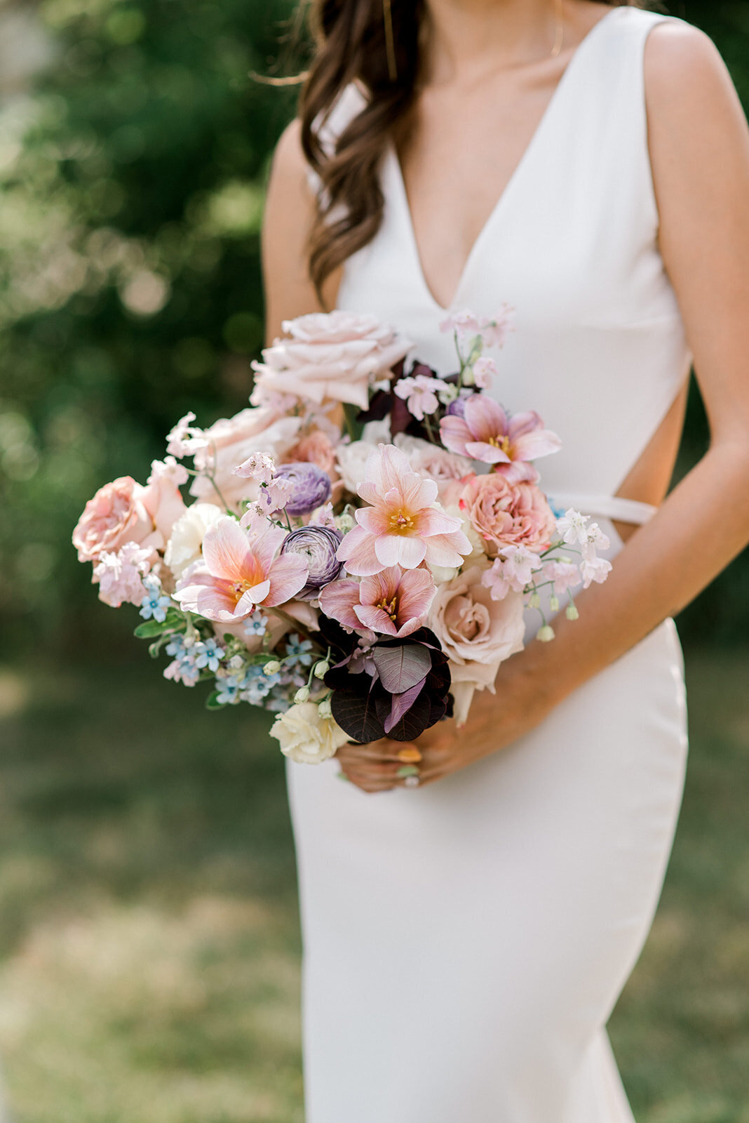Bridal Portrait showing white dress and pink bouquet
