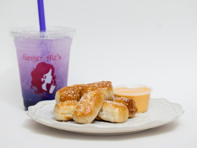 Ginger Ale's located in Illinois & Indiana - Soft Pretzel Bites, Drink with Flavors, and Nacho Cheese in a cup
