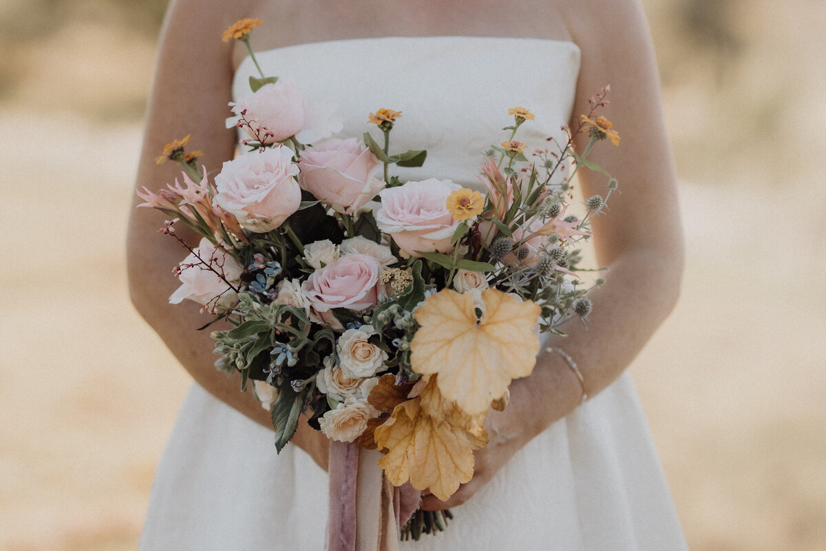 wedding bouquet with roses hydrangea carnations