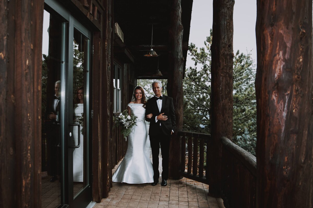 Bride and her father before they walk down the aisle at Spruce Mountain Ranch.