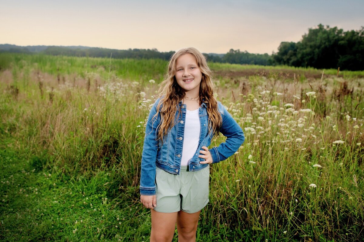 smiling girl in summer field
