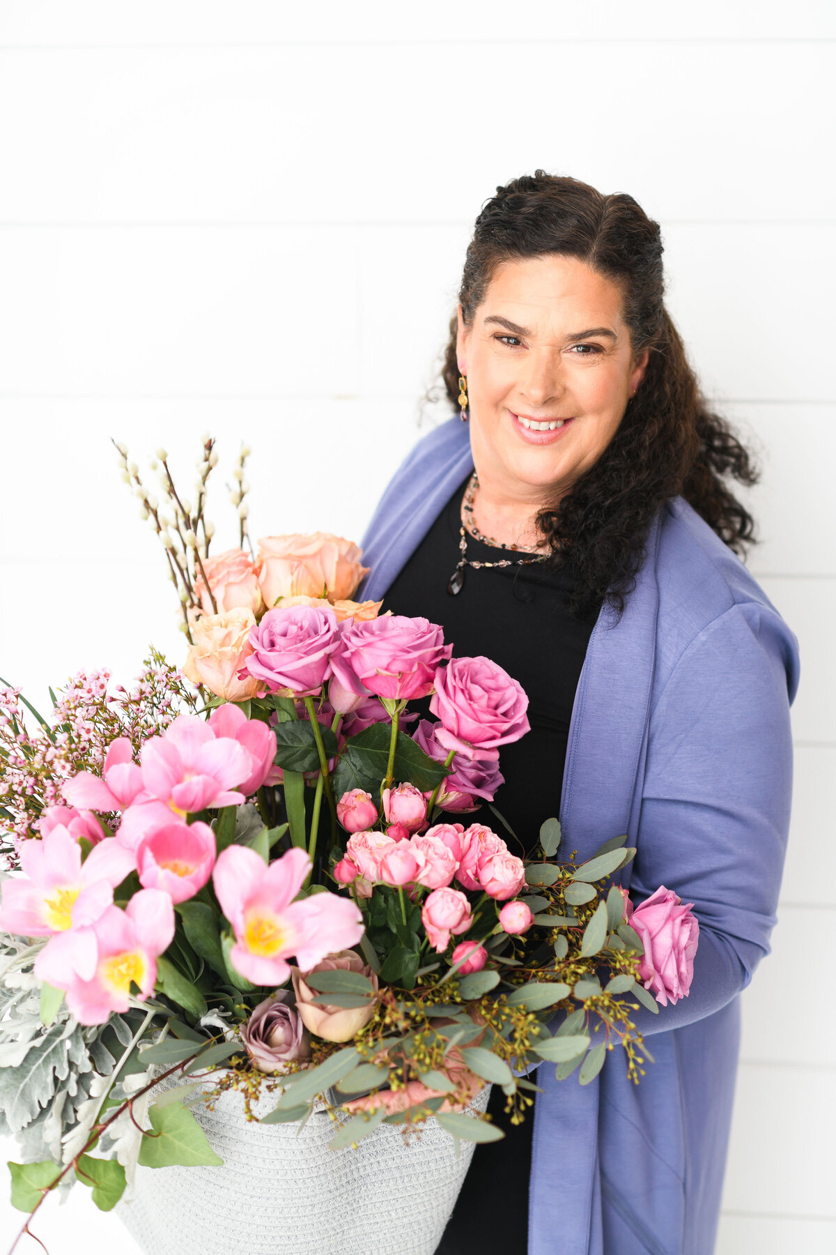 Just Bloom'd Weddings is pleased to introduce our lead designer, Allison Hassard - AIFD!