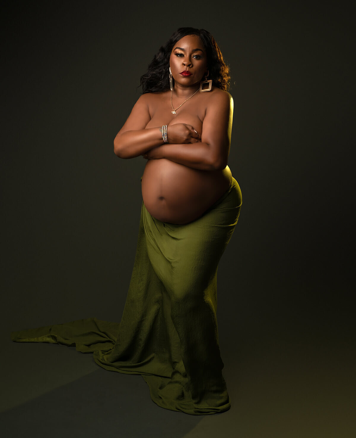 maternity image of  mom wrapped in a fabric