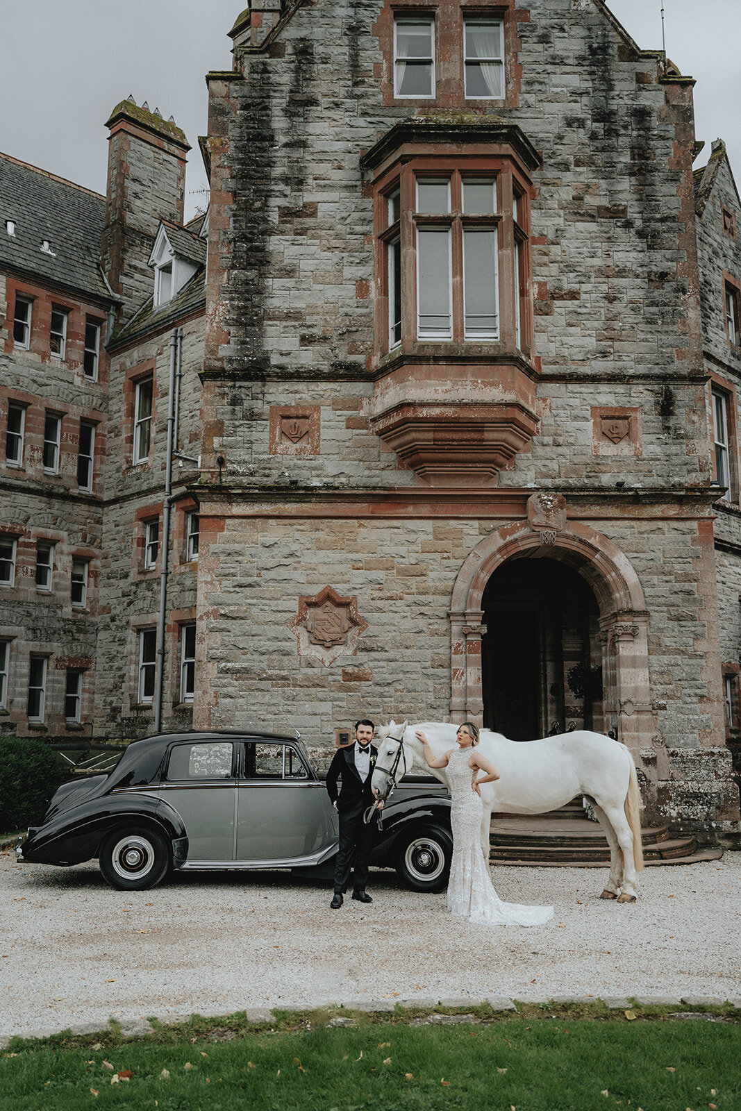 Ireland castle with bride and groom in front with horse and car