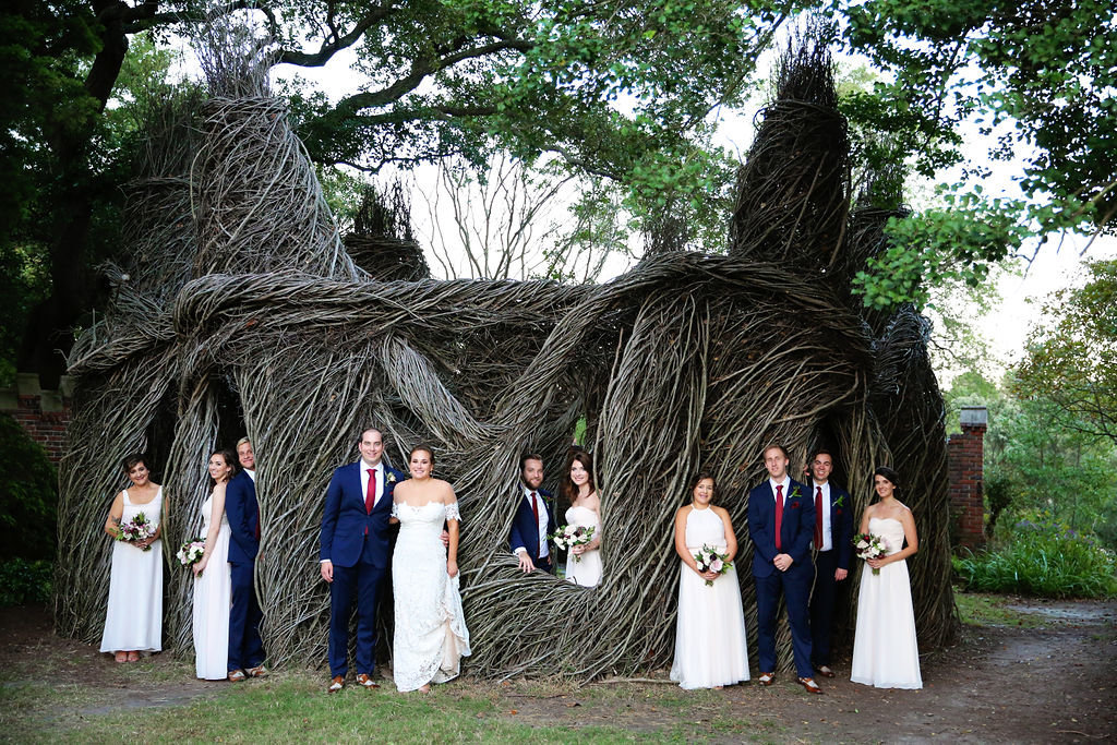 Bridal party poses in vine house at a  Hermitage Museum wedding