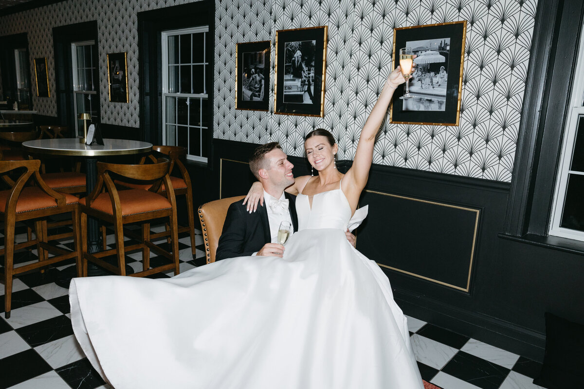 Stunning flash portraits of the bride and groom at The Madison Club, featuring luxurious details that highlight the elegance and sophistication of their wedding celebration.