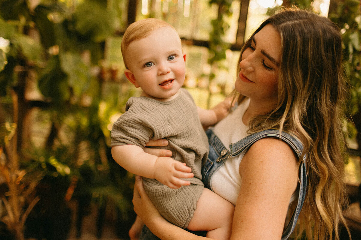 mom snuggling baby in nashville tennessee