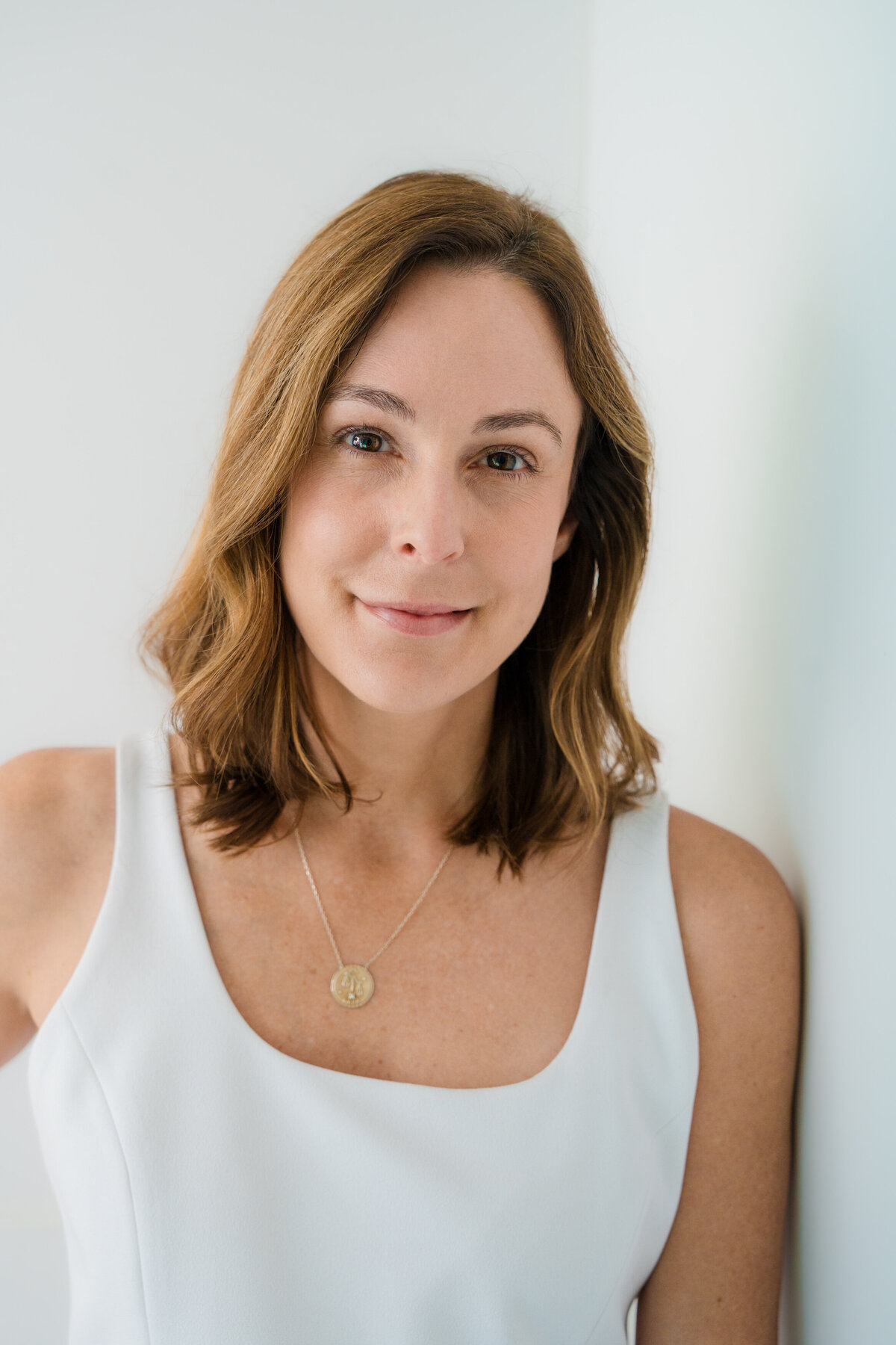 in studio headshot of a woman