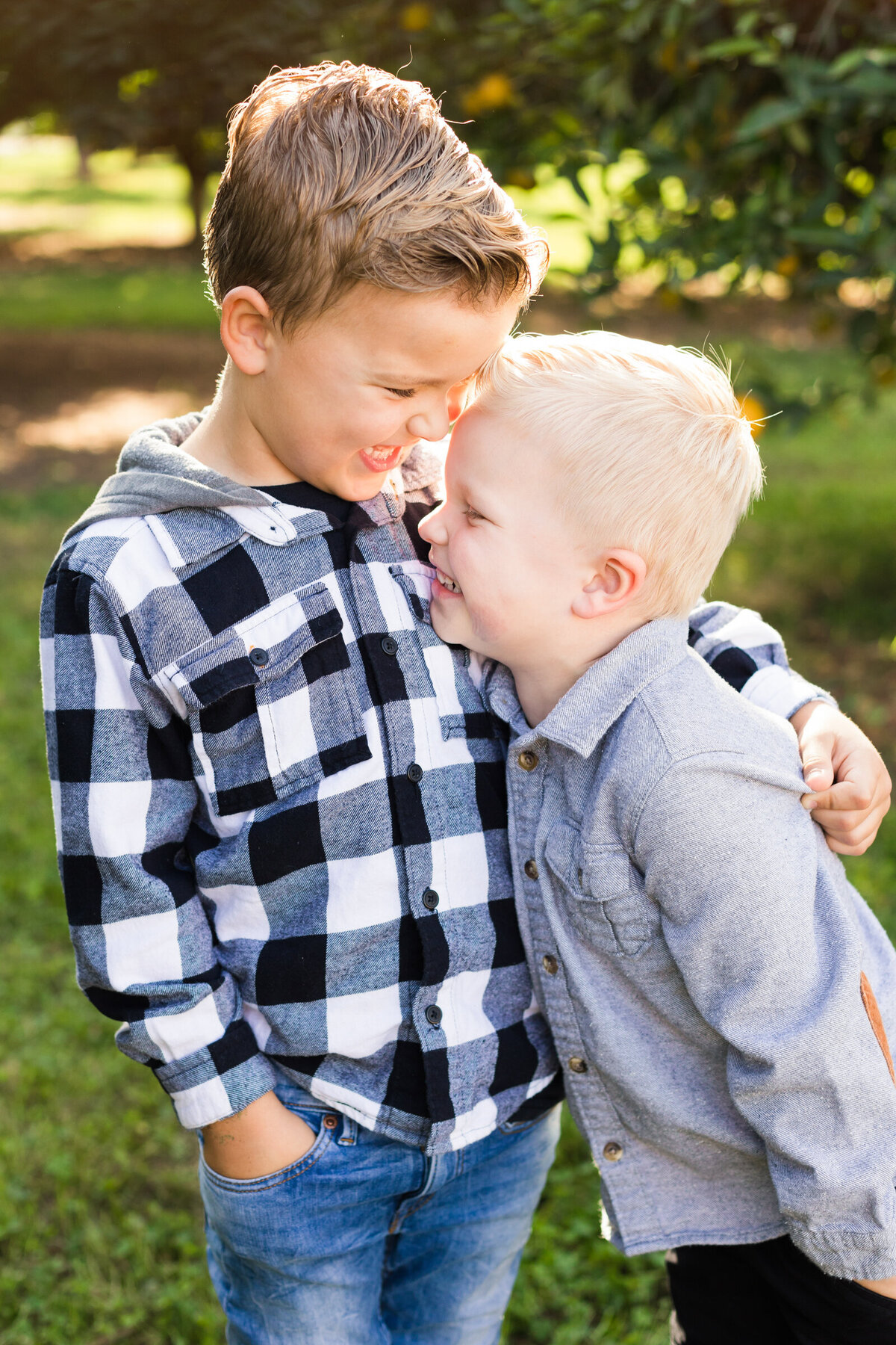 brothers hugging and laughing together