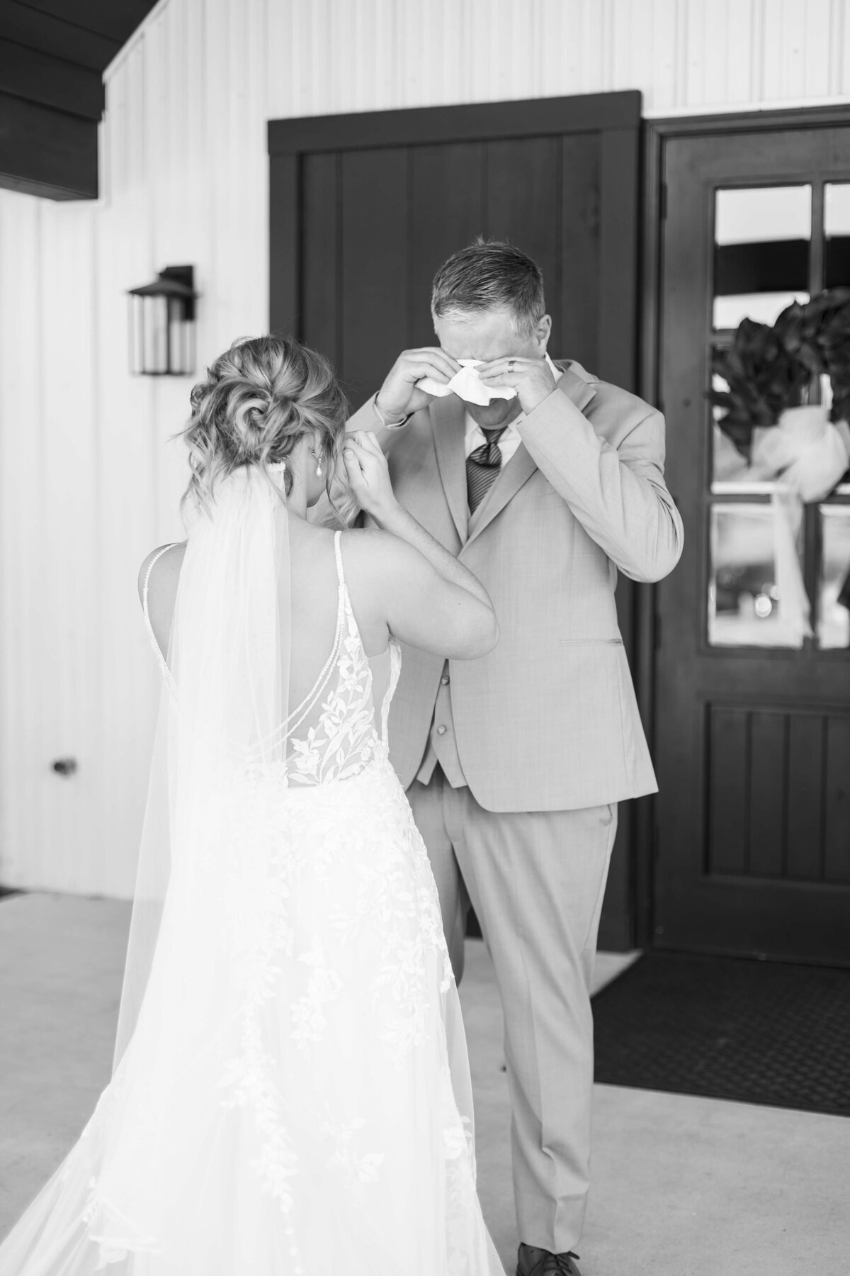 Bride and groom first look at  The Barn at White Oaks, Murray, Kentucky