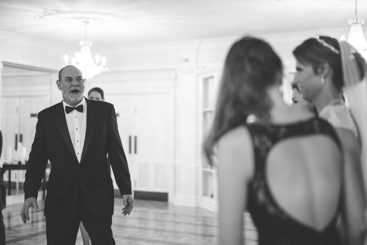 Father of bride sees daughter for the first time in wedding gown after getting ready at Travis Park United Methodist Church