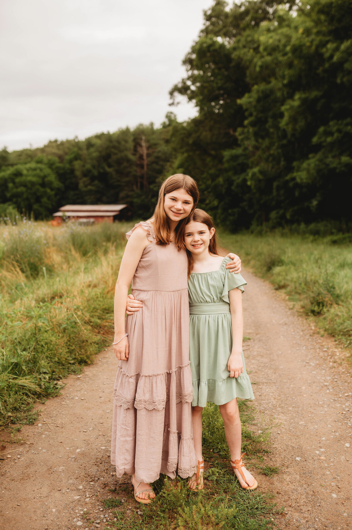 Siblings pose for Portraits during an Extended Family Photoshoot in Asheville, NC.