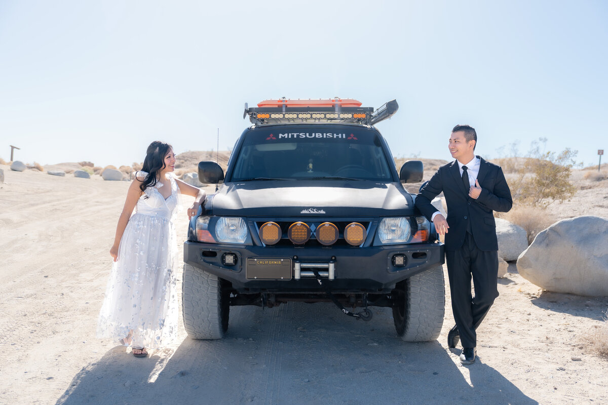 Anza Borrego elopement bride and groom at Fonts Point with 4wd car.