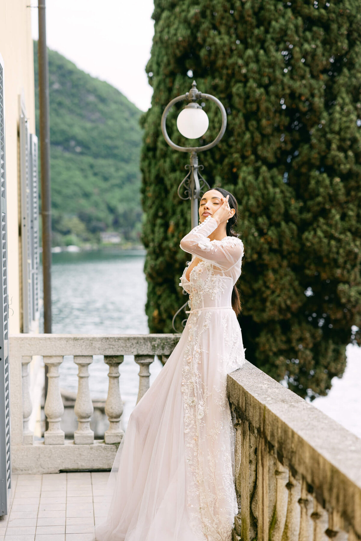 A wedding day bridal shot of a bride in her white dress at Villa Aura del Lago on lake como in Italy