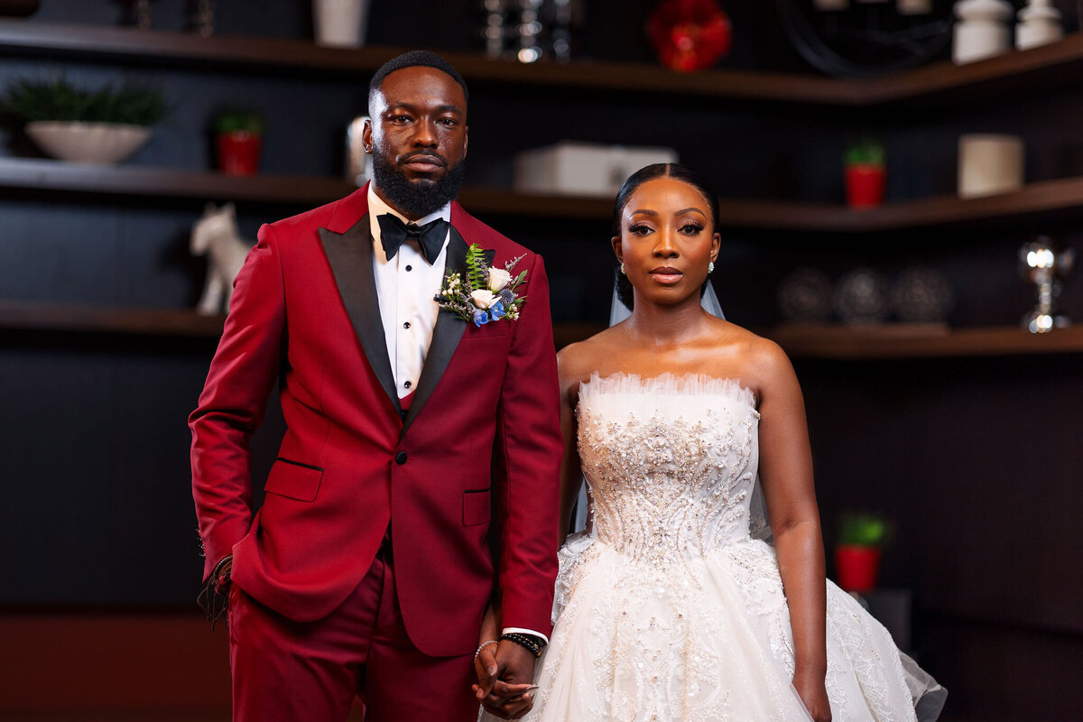 Tomi and Tolu Oruka Events Ziggy on the Lens photographer Wedding event planners Toronto planner African Nigerian Eyitayo Dada Dara Ayoola ottawa convention and event centre pocket flowers Navy blue groom suit ball gown black bride classy  40