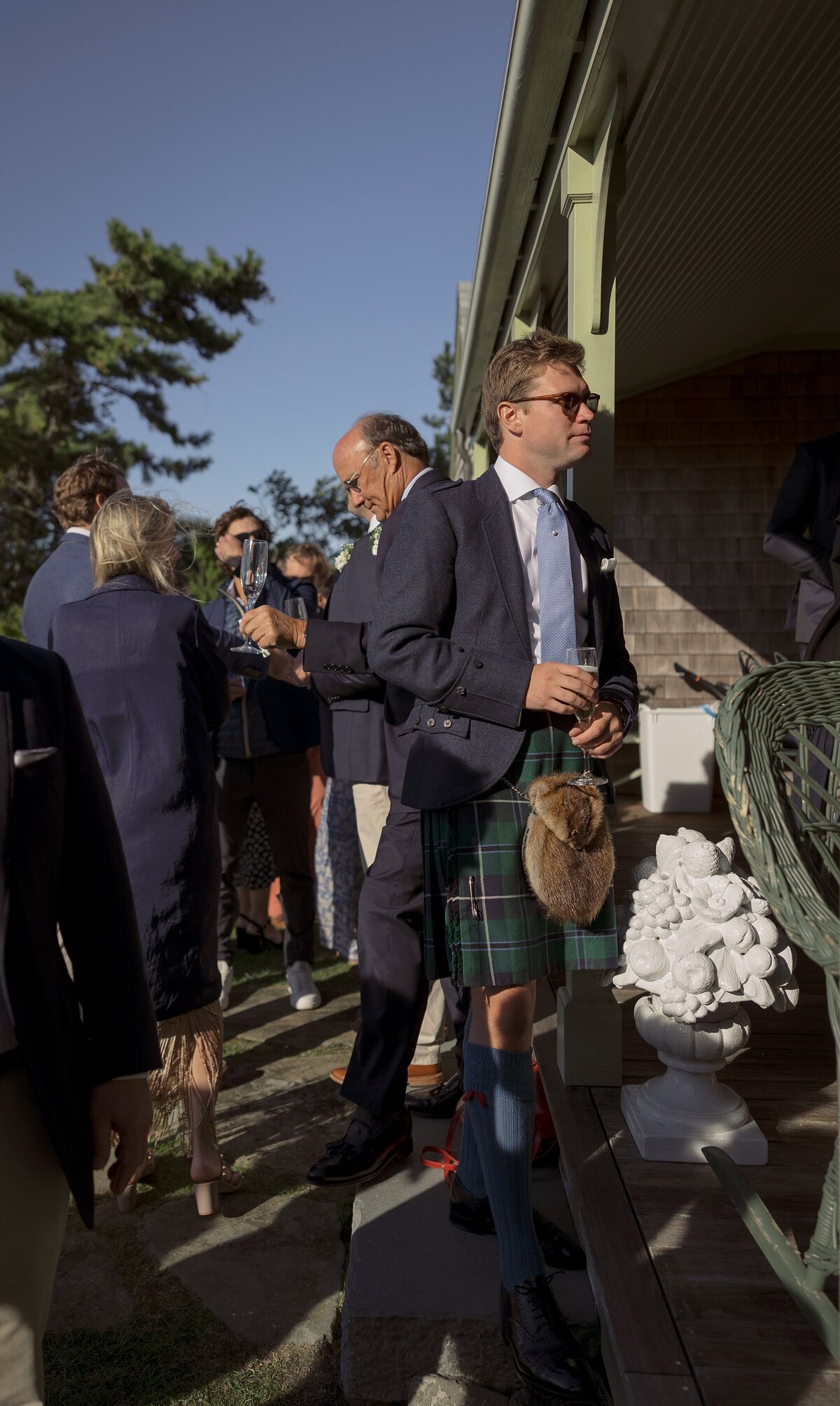 Wedding guest dressed in kilt during Nantucket wedding.