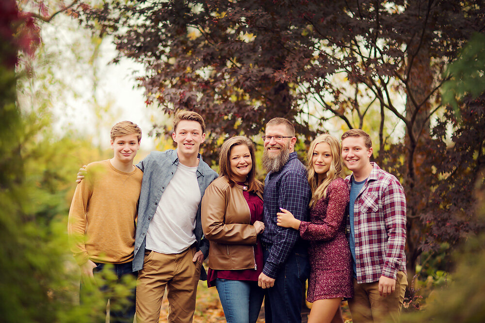 Mom and Dad with four older kids, high school age and up.